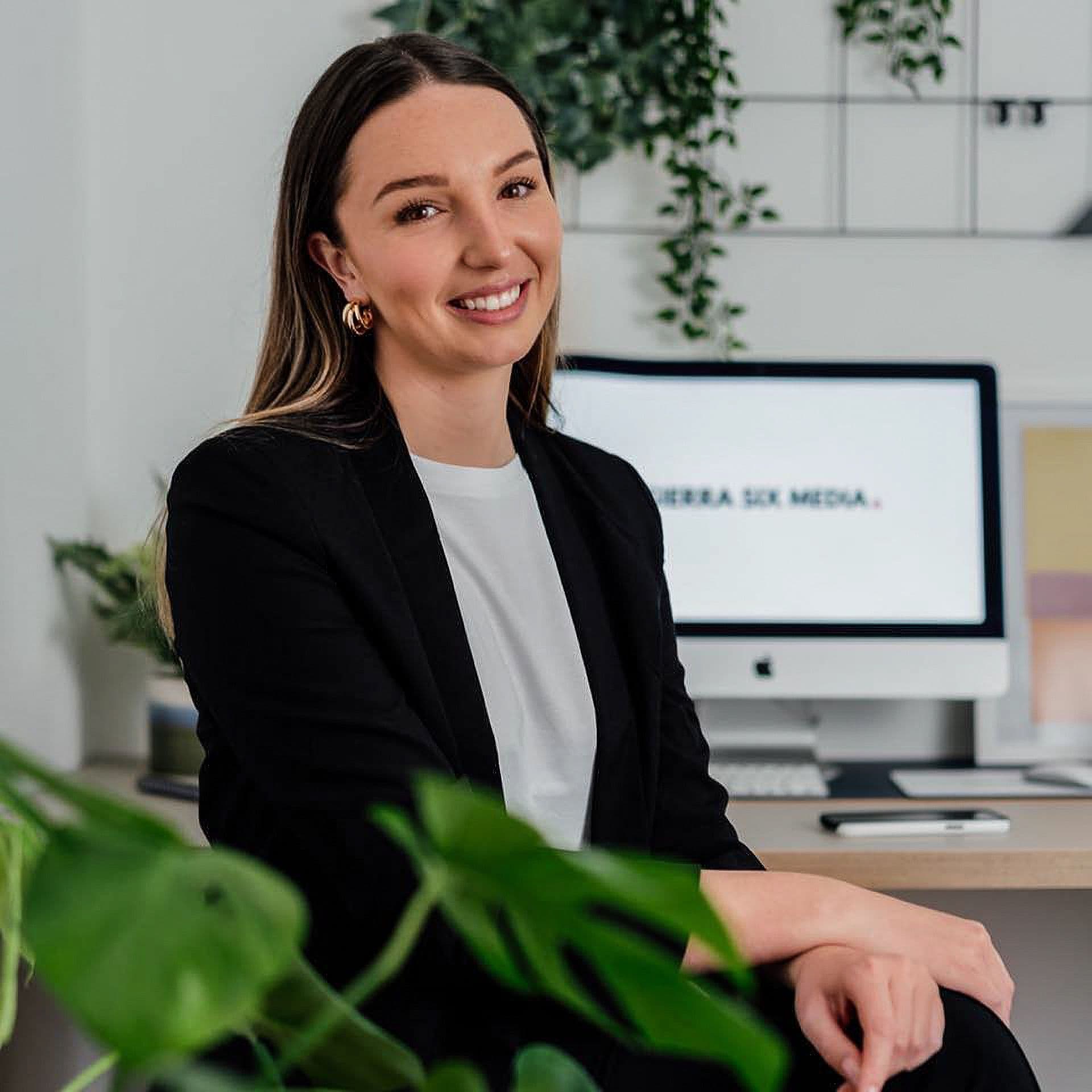 Jade Bartholomew, founder of Sierra Six Media, in a studio environment.